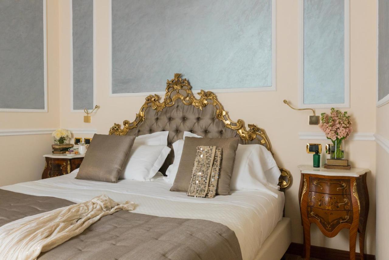 Hotel Bernini Palace Флоренция Экстерьер фото A bedroom at the hotel