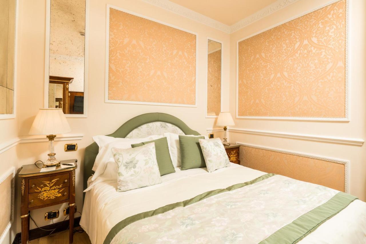 Hotel Bernini Palace Флоренция Экстерьер фото A bedroom at the hotel