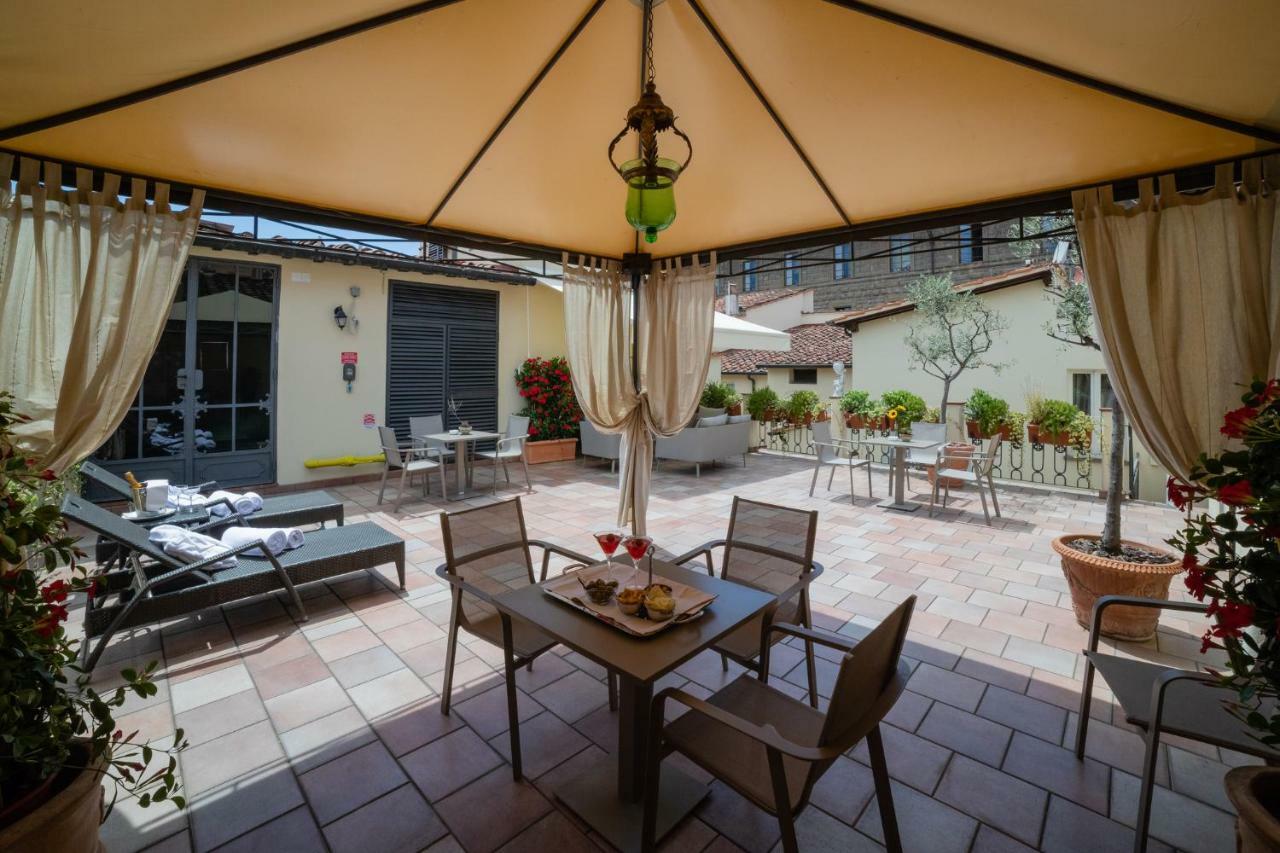 Hotel Bernini Palace Флоренция Экстерьер фото The hotel's rooftop terrace